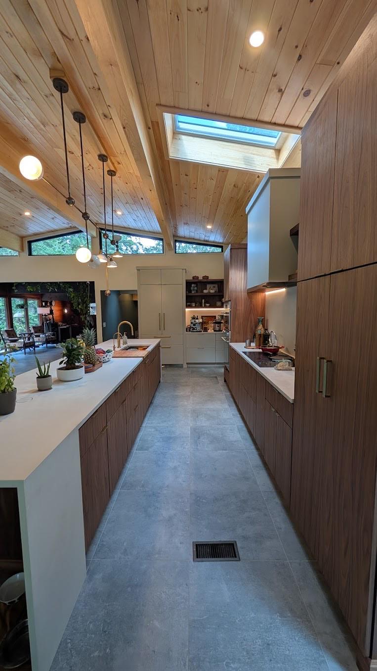 Interior with wood ceiling and skylights