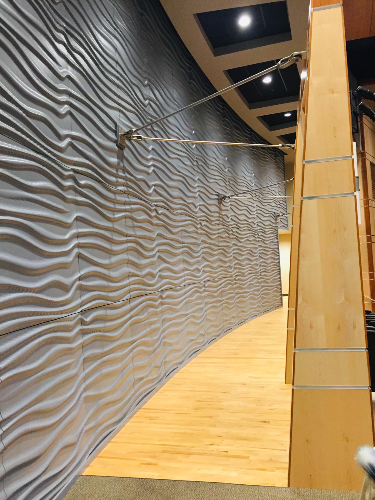 Completed textured wall and wood flooring